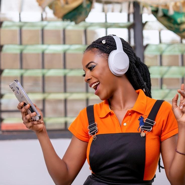 Kaveri Mehta, Lead Design Curator at CoveGreenMarket, reviewing corporate floral arrangements